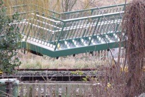 Steps arriving next to railway track