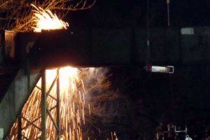 Showers of sparks as the old bridge is dismantled