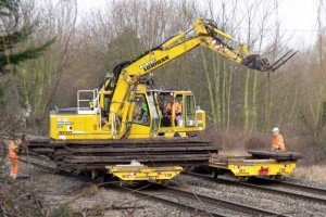 Rail-mounted lifter clears remaining metawork by daylight