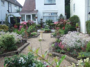 Stone-edged beds surrounded by gravel