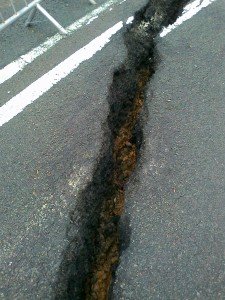 Deep crack in tarmac surface